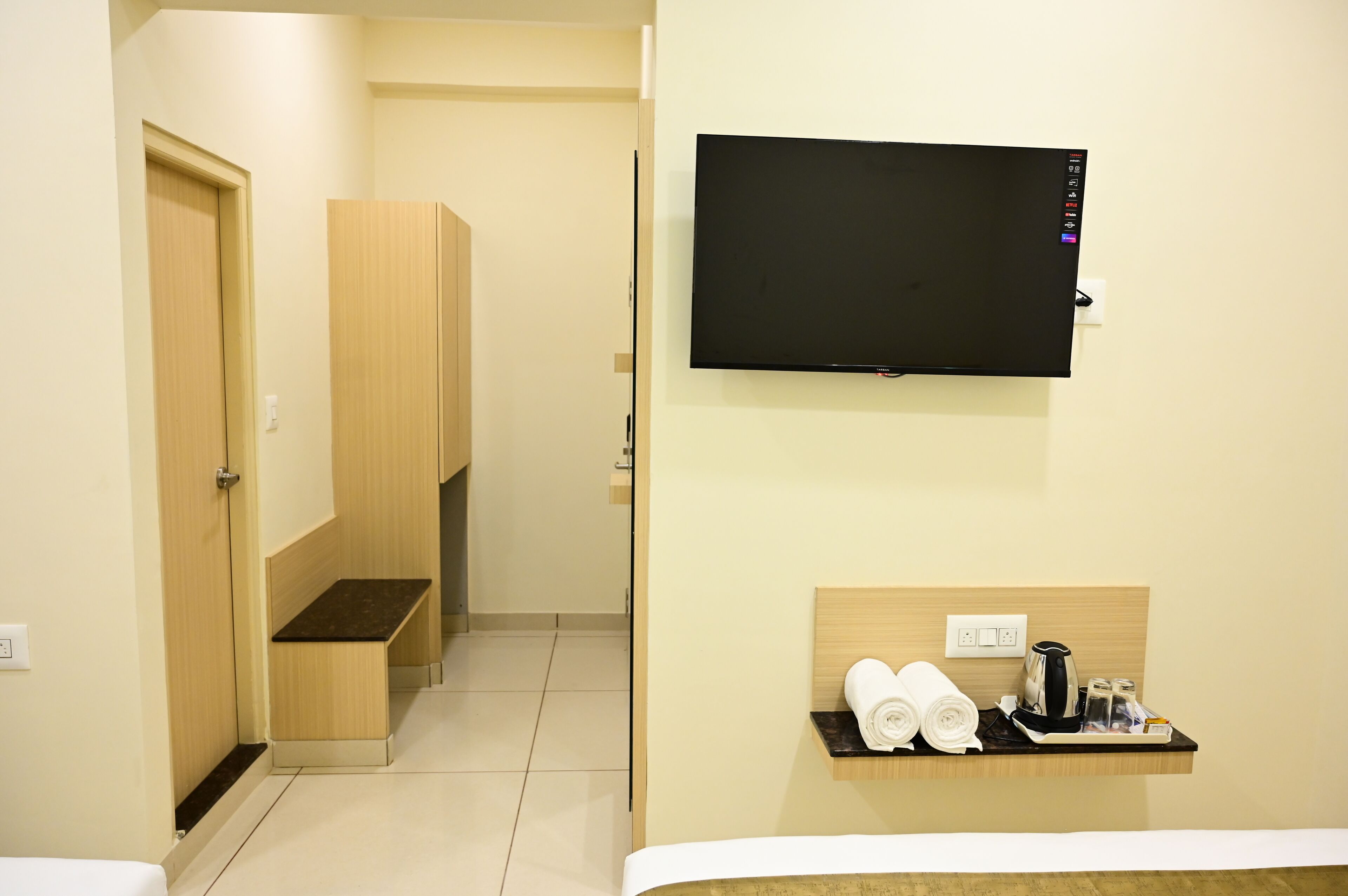 Family Double Room, City View | In-room safe, desk, laptop workspace, iron/ironing board