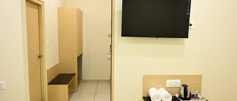 Family Double Room, City View | In-room safe, desk, laptop workspace, iron/ironing board