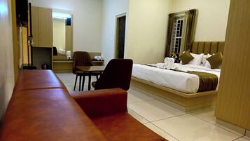 Grand Double Room, City View | In-room safe, desk, laptop workspace, iron/ironing board