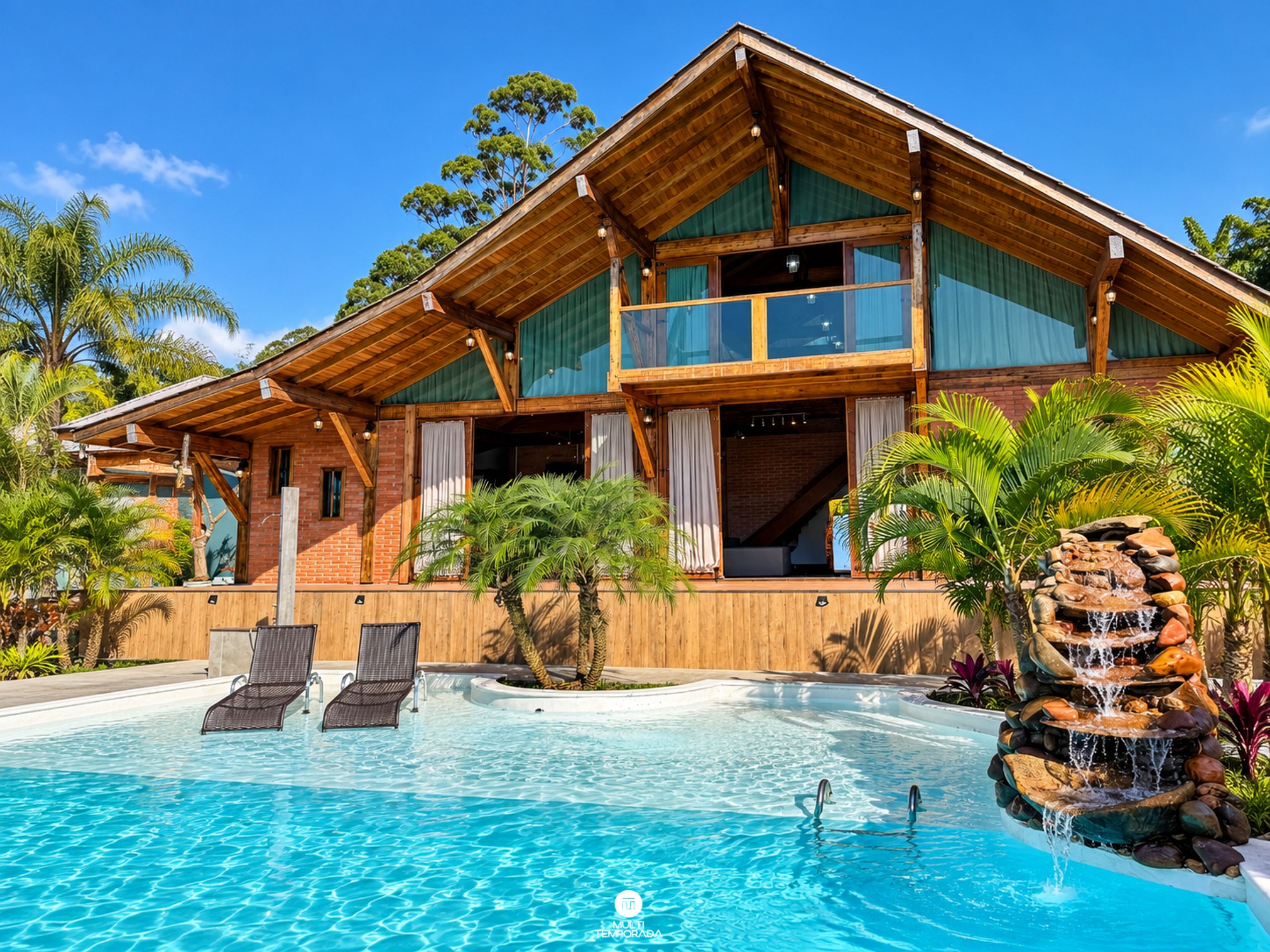 A two-story wooden house with a swimming pool, outdoor seating, and a waterfall feature.