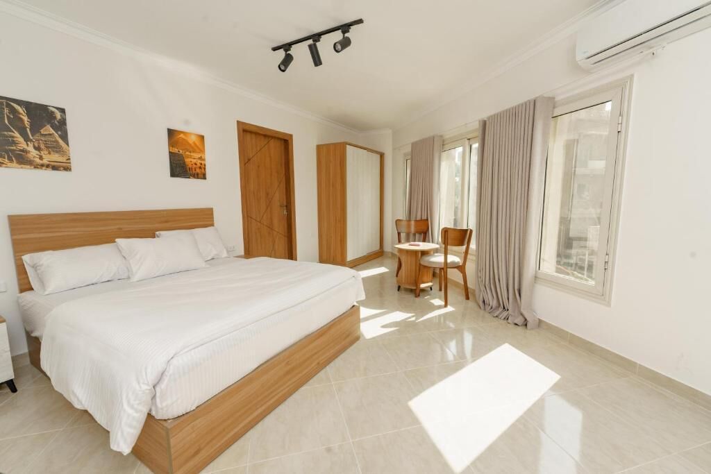 Family Room, Balcony, City View | Free WiFi