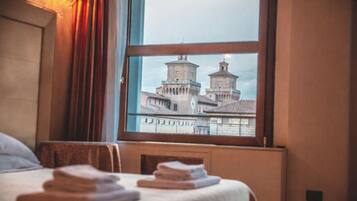 Deluxe Room, City View | In-room safe, desk, laptop workspace, soundproofing