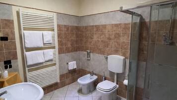 Shower, free toiletries, hair dryer, towels