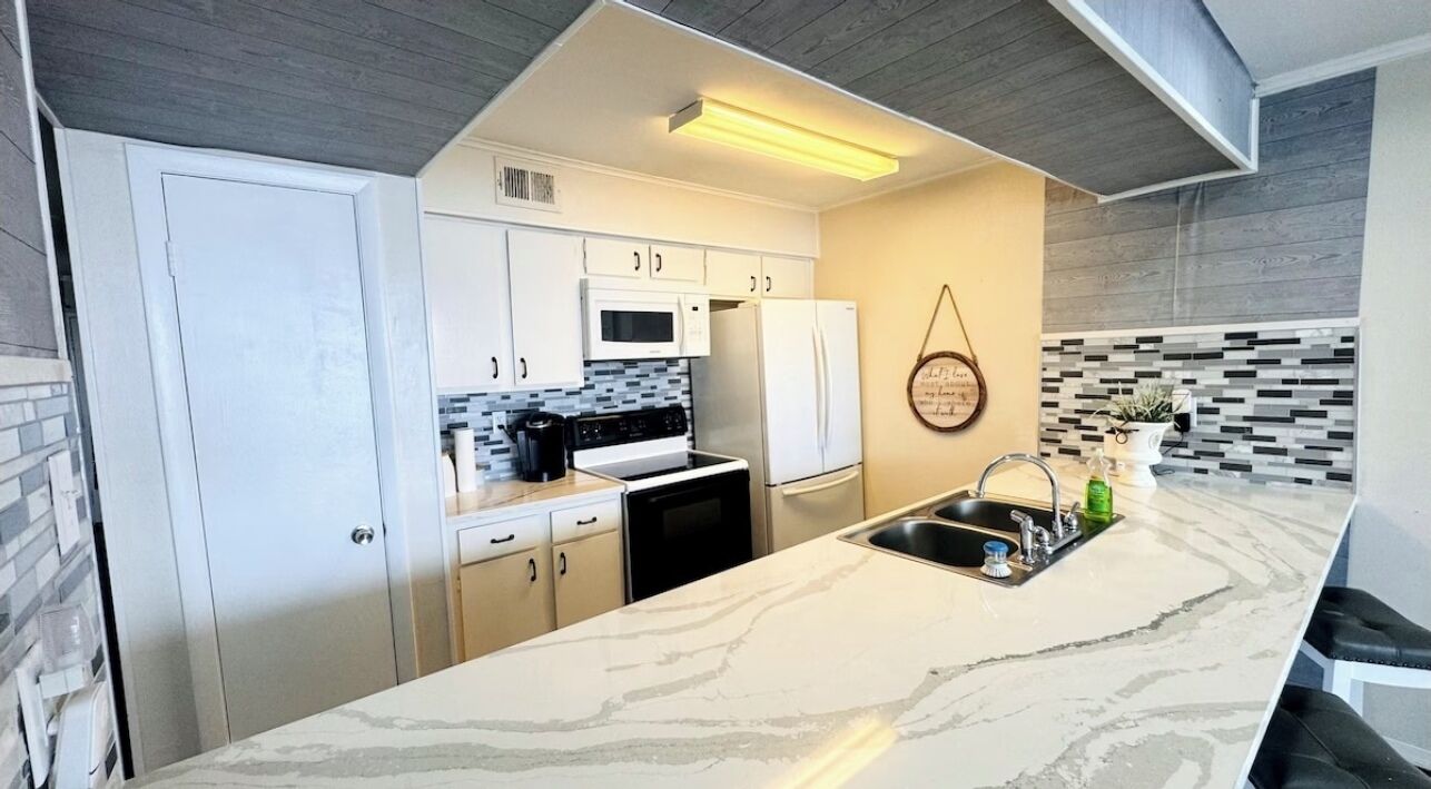 Microwave, oven, coffee/tea maker, cookware/dishes/utensils