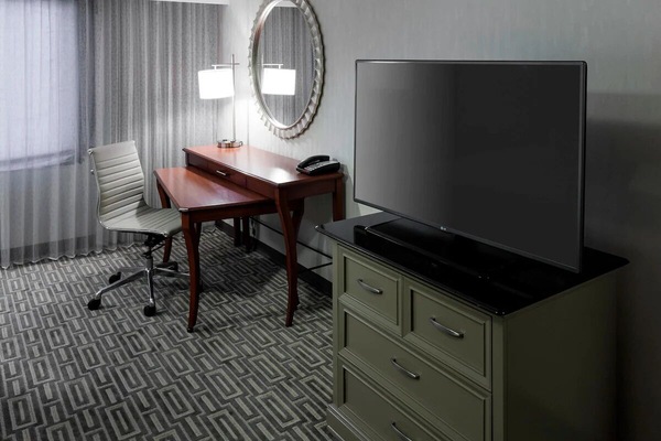 Settle into a productive workspace with easy in-room entertainment.