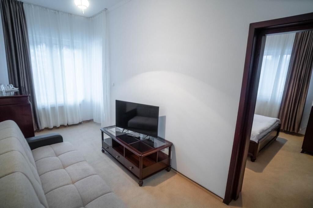 Family Apartment, Balcony, Mountain View | Blackout drapes, free WiFi