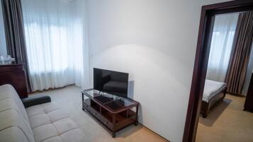 Family Apartment, Balcony, Mountain View | Blackout drapes, free WiFi