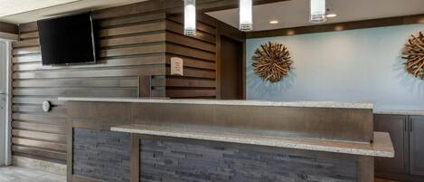 Check in smoothly at a modern, welcoming front desk.