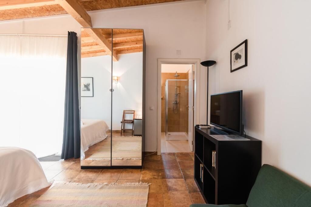 Standard Double Room, Balcony, Garden View | Iron/ironing board, free WiFi