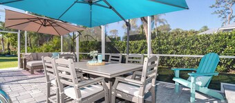 Charming 2-bedroom beach themed Englewood house with heated pool and large yard.