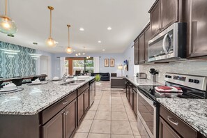 Fridge, microwave, oven, stovetop - Last Minute Disney! Private Pool, Hot Tub, Game Room & Themed Bedrooms. Book Now! #117659 (Orlando)
