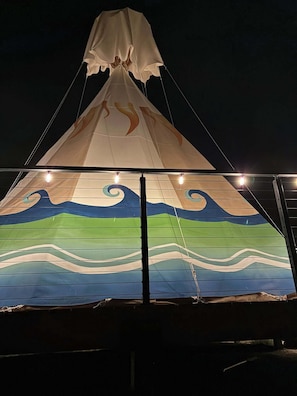 A tent with a wave pattern design.