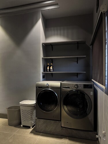 Wabi Sabi themed 2 bedroom apartment with smart features.