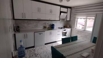 Apartment, City View, Garden Area | Private kitchen