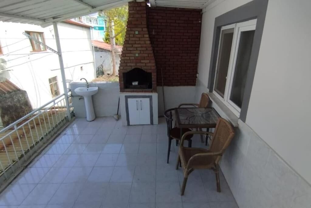 Apartment, City View, Garden Area | Outdoor dining