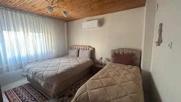 Huoneisto, kaupunkinäköala, puutarha-alue | Pimennysverhot, silitysrauta/-lauta, ilmainen Wi-Fi