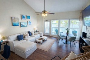 TV, table football - Fresh & Bright 1BR Condo - Pool View & Steps to Beach (South Padre Island)