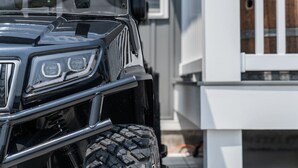 A close-up of a vehicle's front grille and headlights. - 4 Seat Golf Cart~Family Friendly~Near DT Beaufort! (Beaufort)