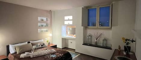 1 habitación, tabla de planchar con plancha, wifi y ropa de cama