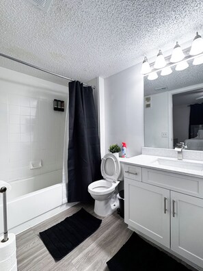 Hair dryer, towels, soap, shampoo