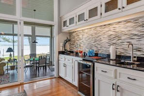 Fridge, microwave, oven, stovetop - Big Red | Soundfront Dock · Private Beach · 4BR PKS (Pine Knoll Shores)
