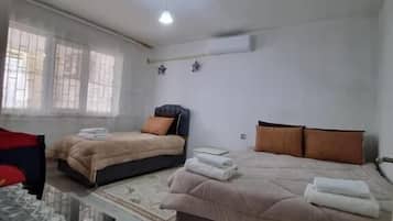 Apartment, Patio, Courtyard View | Iron/ironing board, free WiFi