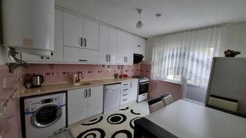 Apartamento, varanda, vista para o pátio | Cozinha privada