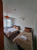 Apartment, Patio, Courtyard View | Iron/ironing board, free WiFi