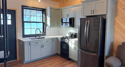 Welcome to “The Old Orchard Cottage”. A cozy 2-bedroom cabin in LaFayette, NY.