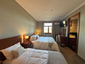 Luxury Triple Room, Patio, Courtyard View | Free WiFi, wheelchair access