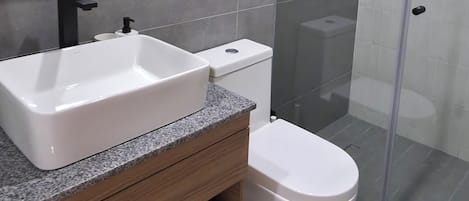 Shower, hair dryer, towels, soap