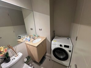 Hair dryer, towels, soap, toilet paper