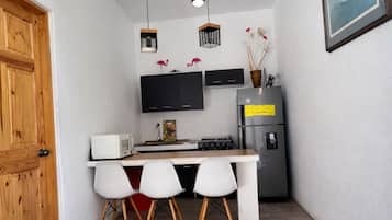 Apartment, 1 Bedroom, Pool View | Private kitchen | Full-size fridge, blender, cookware/dishes/utensils, freezer