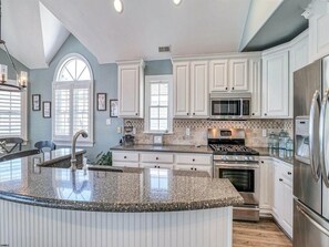 Fridge, microwave, oven, stovetop - Spectacular Southend 3BR Condo • Sleeps 7 • Rooftop Deck & Parking (Ocean City)