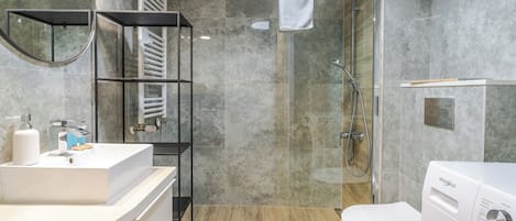 Shower, hair dryer, towels