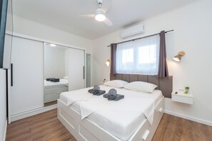 3 habitaciones, tabla de planchar con plancha, wifi y ropa de cama 