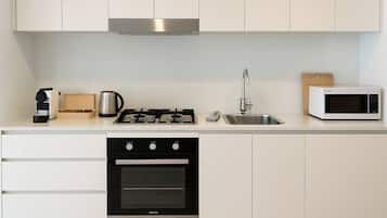 Apartamento, vista para a cidade | Cozinha privada