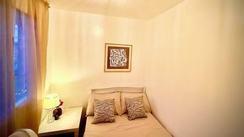 2 dormitorios, tabla de planchar con plancha, Internet y ropa de cama