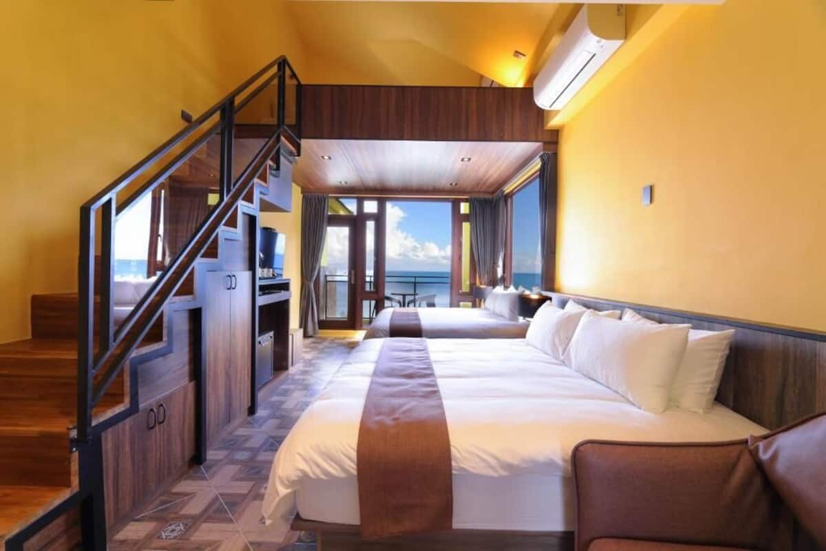 Deluxe Quadruple Room, 2 Queen Beds, Balcony, Sea View | Minibar, soundproofing, free WiFi, wheelchair access