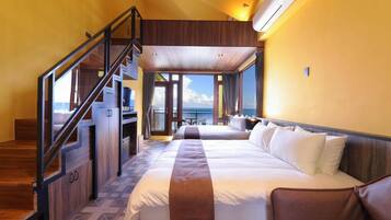 Deluxe Quadruple Room, 2 Queen Beds, Balcony, Sea View | Minibar, individually decorated, individually furnished, soundproofing
