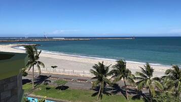Deluxe Quadruple Room, 2 Queen Beds, Balcony, Sea View | Beach