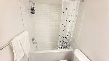 Hair dryer, towels, soap, shampoo