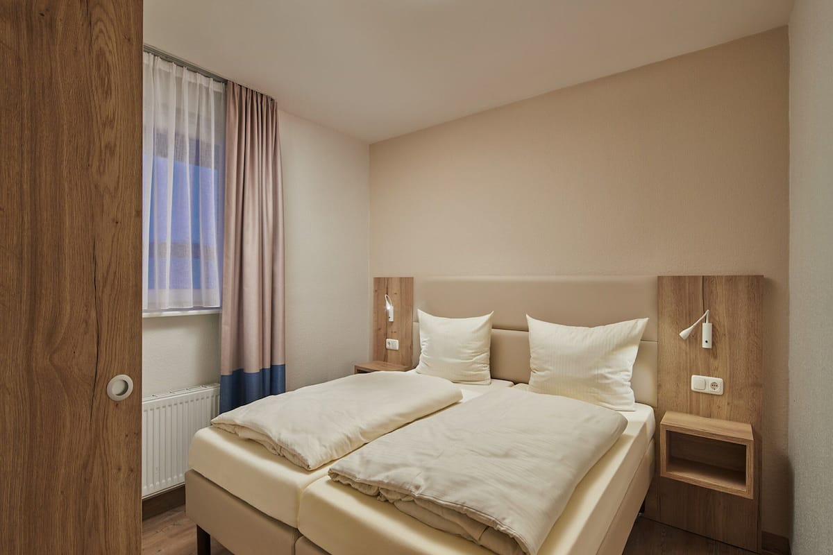 Deluxe Apartment, 3 Bedrooms | 11 bedrooms, individually furnished