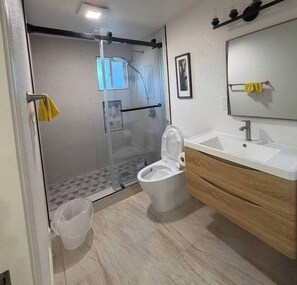 Shower, towels, toilet paper