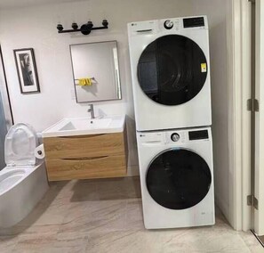 Shower, towels, toilet paper