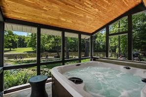 A hot tub with a view of a park and a wooden ceiling. - Grand River Estate IndoorPool/Swim Pond/25 Acres (Thompson)