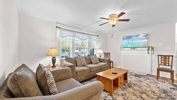 Signature Condo, 2 Bedrooms, Patio, Garden View | Living room | 40-inch Smart TV with digital channels, fireplace