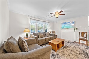 Signature Condo, 2 Bedrooms, Patio, Garden View | Living room | 40-inch Smart TV with digital channels, fireplace