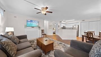 Signature Condo, 2 Bedrooms, Patio, Garden View | Living room | 40-inch Smart TV with digital channels, fireplace