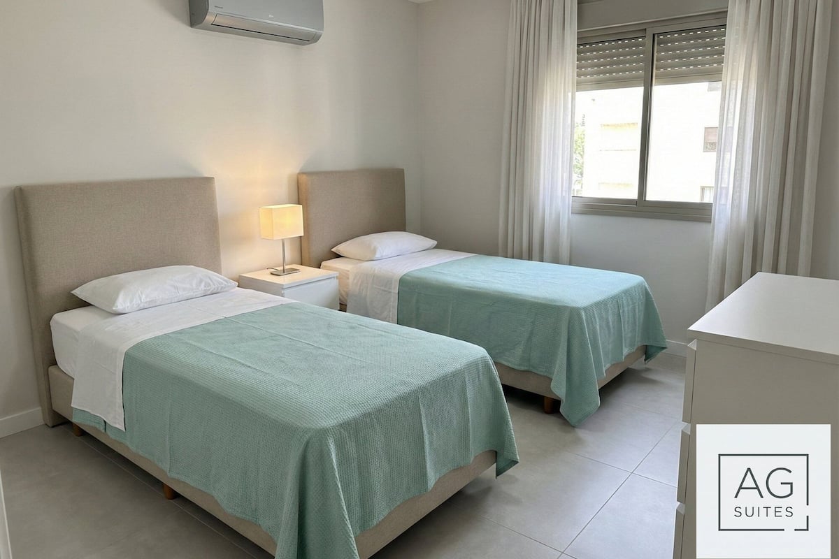 Condo luxueux, vue partielle sur la mer | Coffre-fort, bureau, espace de travail pour ordinateurs portables